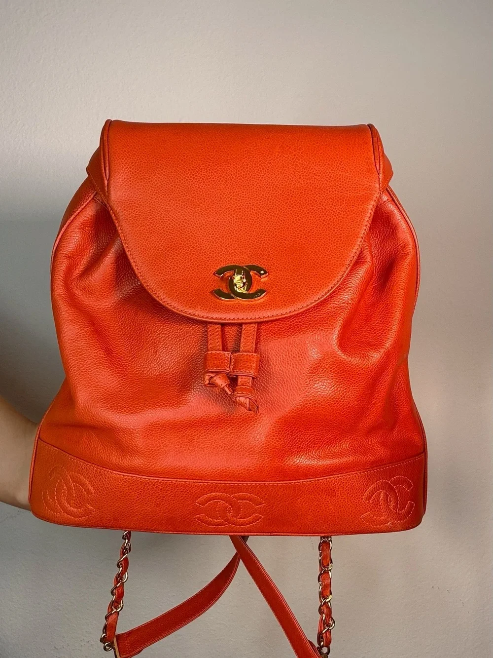 CHANEL Orange Caviar Leather Backpack with CC Trim and Gold Hardware